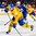BUFFALO, NEW YORK - JANUARY 4: Sweden's Erik Brannstrom #26 attempts a shot on goal against USA during the semi-final round of the 2018 IIHF World Junior Championship. (Photo by Andrea Cardin/HHOF-IIHF Images)

